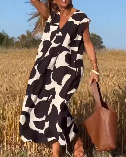 SITA™ | Vestido Elegante con Estampado y Escote en V