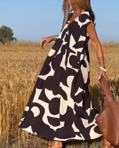 SITA™ | Vestido Elegante con Estampado y Escote en V
