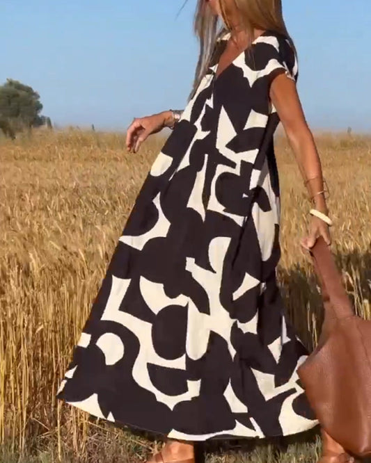 SITA™ | Vestido Elegante con Estampado y Escote en V