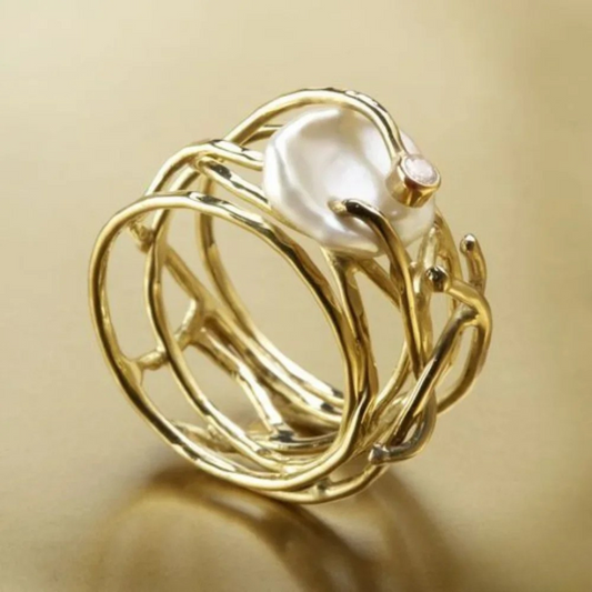 Anillo dorado vintage con perla